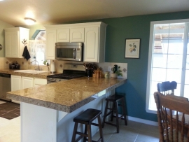 Side view of a remodeled kitchen by Ackerman Construction